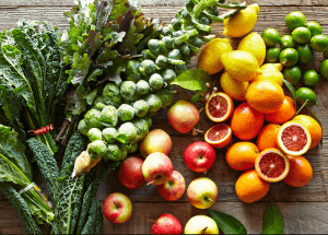 a group of fruits and vegetables on a wood surface Healthy Weight Loss Diets Owsestry